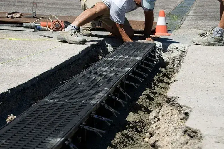 Installing channel drains from Dakota